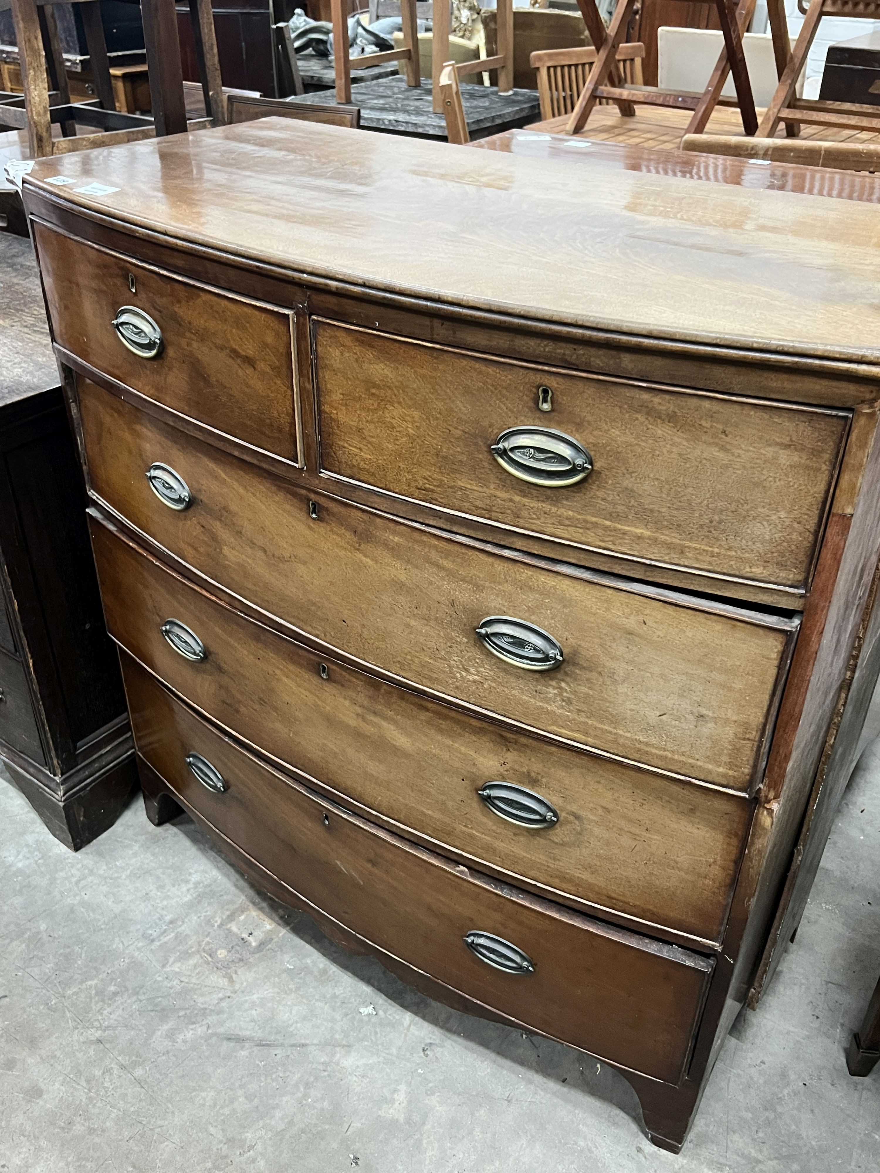 A Regency mahogany bow front chest, width 102cm, depth 52cm, height 107cm